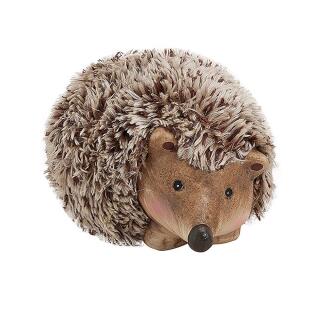 Igel liegend schaut nach rechts aus Ton/Kunstfell  10 x 15 x 8 cm