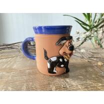 Blaue Keramik-Tasse mit munterem Hund